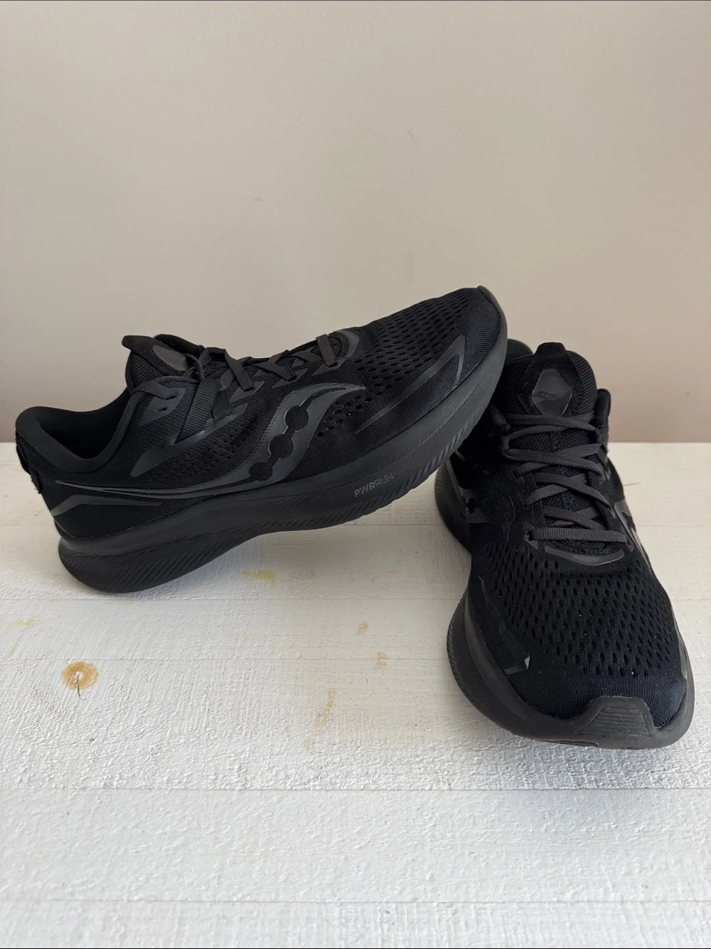 Women’s Saucony Ride 15 All-Black Running Sneakers.